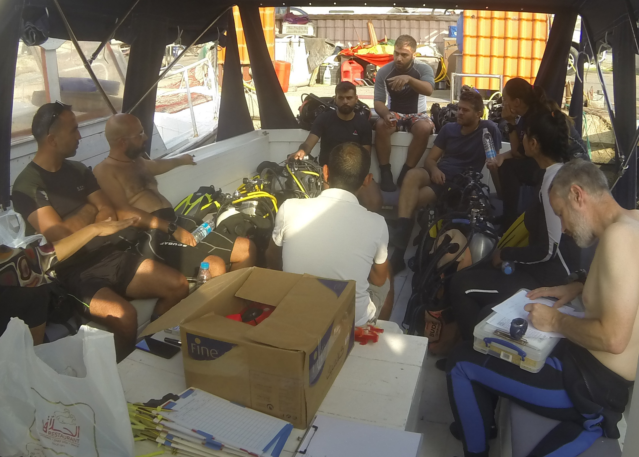 Nassem providing the dive briefing on the boat